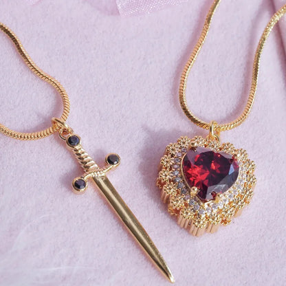Cadenas para pareja corazón y espada / daga